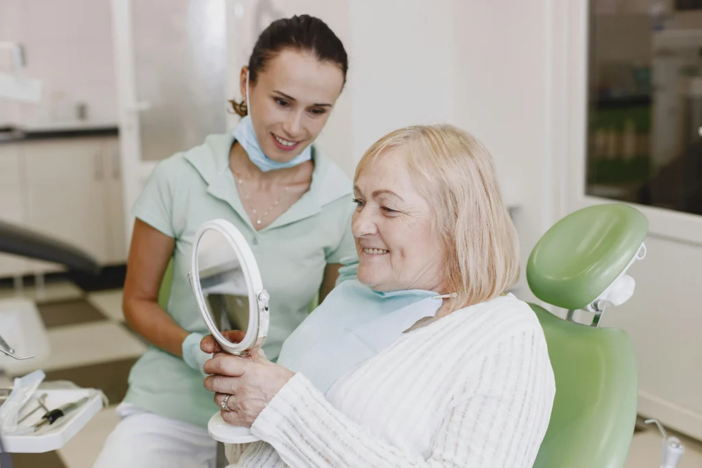 lady trying on new dentures